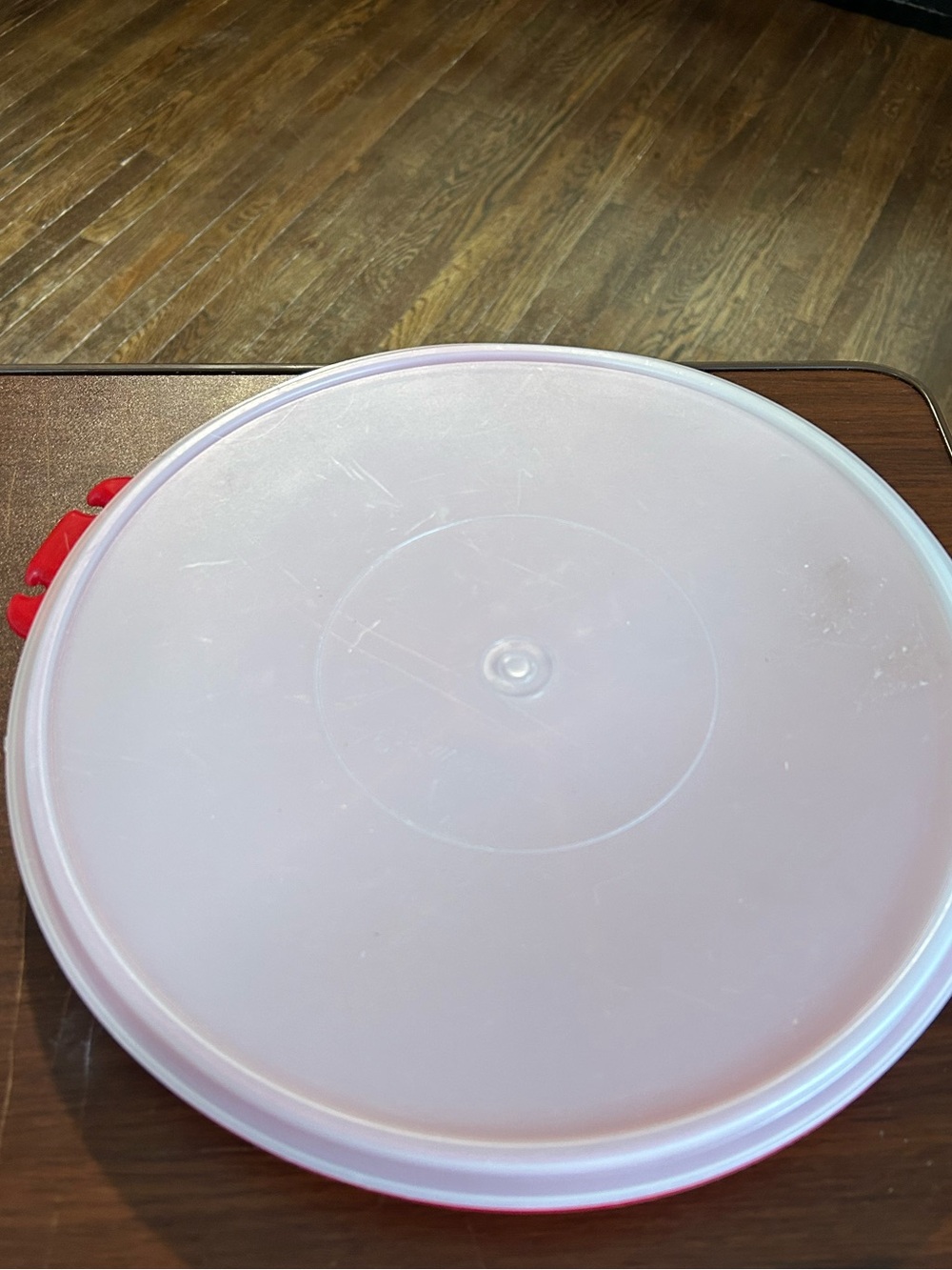 Vintage red Tupperware with six divided pie shaped sections&center, 4 toothpicks